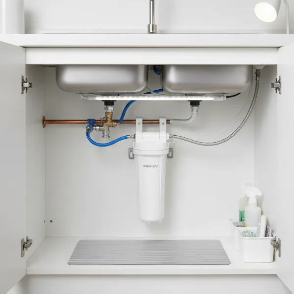 Waterdrop 15UA under-sink filter installed neatly, connected to a cold water line.